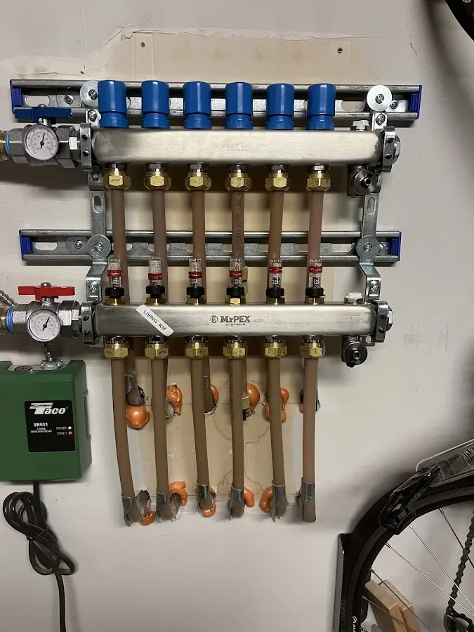 Plumber performing Leak Detection at a residential property in Utica